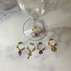 2/$15❤️❤️Gold & purple wine charms set of 5